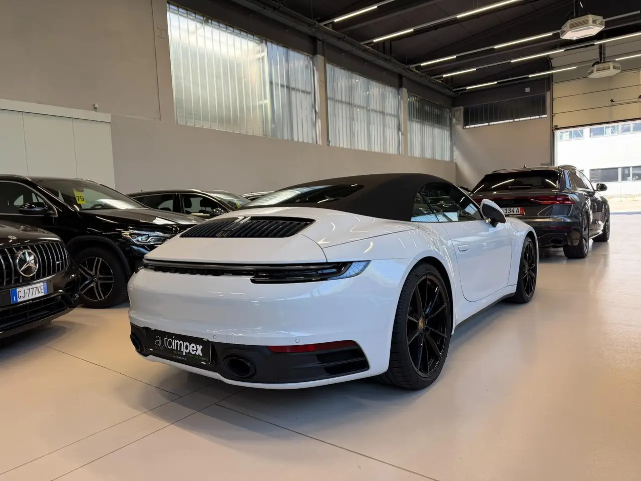 Porsche 911 Carrera S Cabrio (992) 2025, side profile — Priveo Cars, Europe